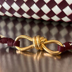 MEDIUM ANDIAMO 32 IN ROT-WEISSEM KALBSLEDER