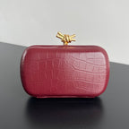 KNOTEN 19 IN BURGUNDERROTEM KROKODILMUSTER-KALBLEDER