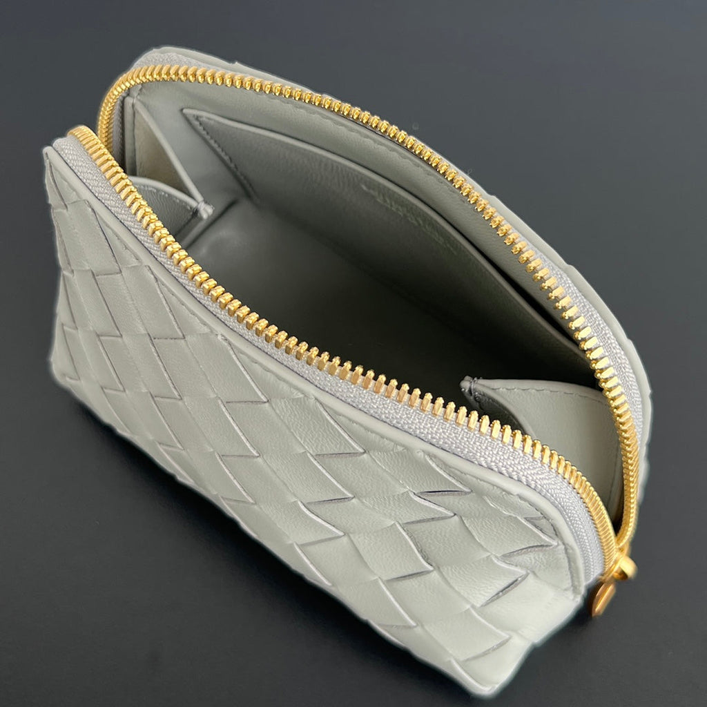 INTRECCIATO 16 TASCHE AUS WEISSEM LAMMFELL