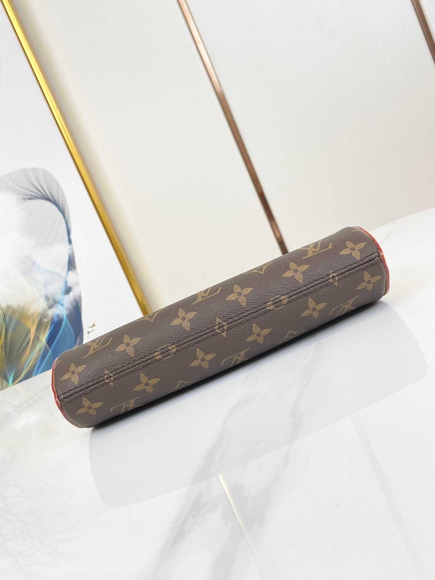 POCHETTE TIRETTE 22 IN BRAUN MONOGRAM CANVAS GOLDENE SCHNALLE