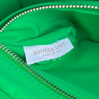 CLUTCH 26 INTRECCIATO AUS KALBSLEDER IN MALACHITGRÜN