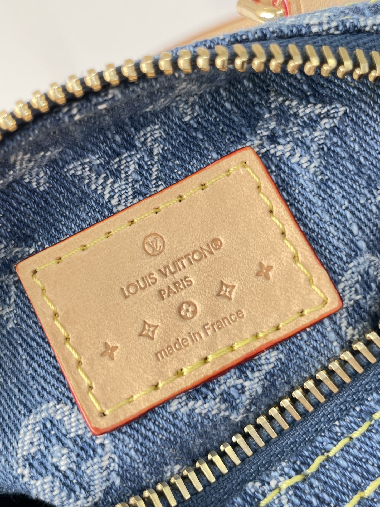 NANO SPEEDY 16 IN BLAUEM MONOGRAMM-DENIM GOLDENE HARDWARE