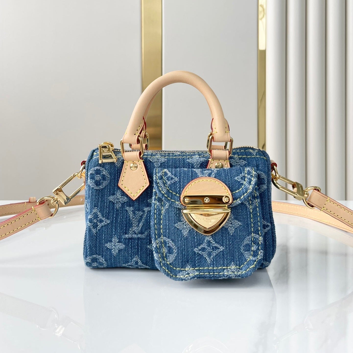 NANO SPEEDY 16 IN BLAUEM MONOGRAMM-DENIM GOLDENE HARDWARE
