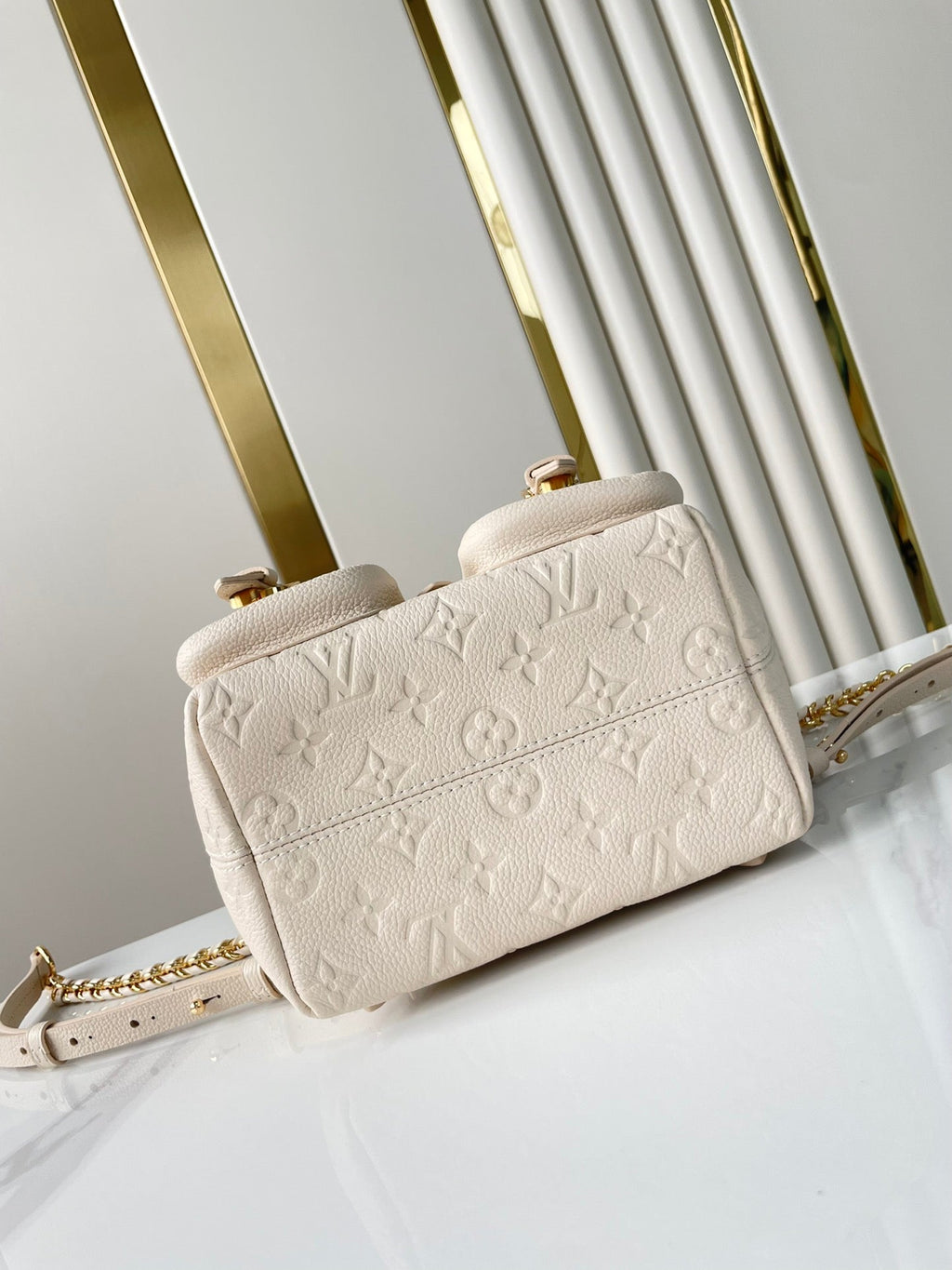 BACKUP-RUCKSACK 22 ZOLL CREME MONOGRAMM EMPREINTE LEDER