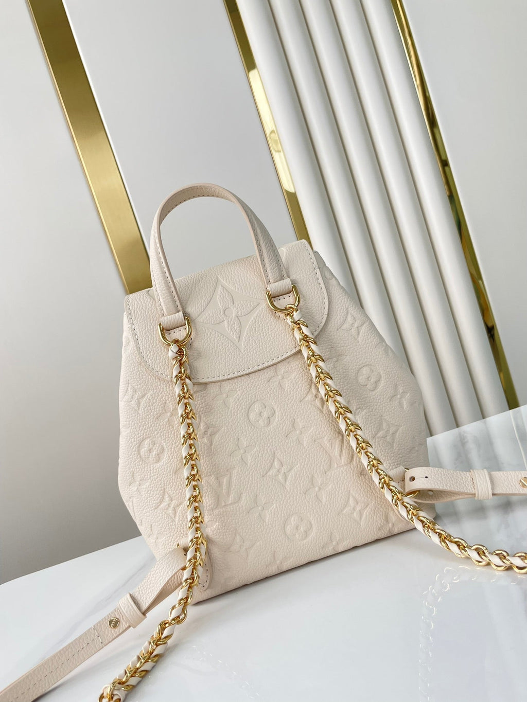 BACKUP-RUCKSACK 22 ZOLL CREME MONOGRAMM EMPREINTE LEDER