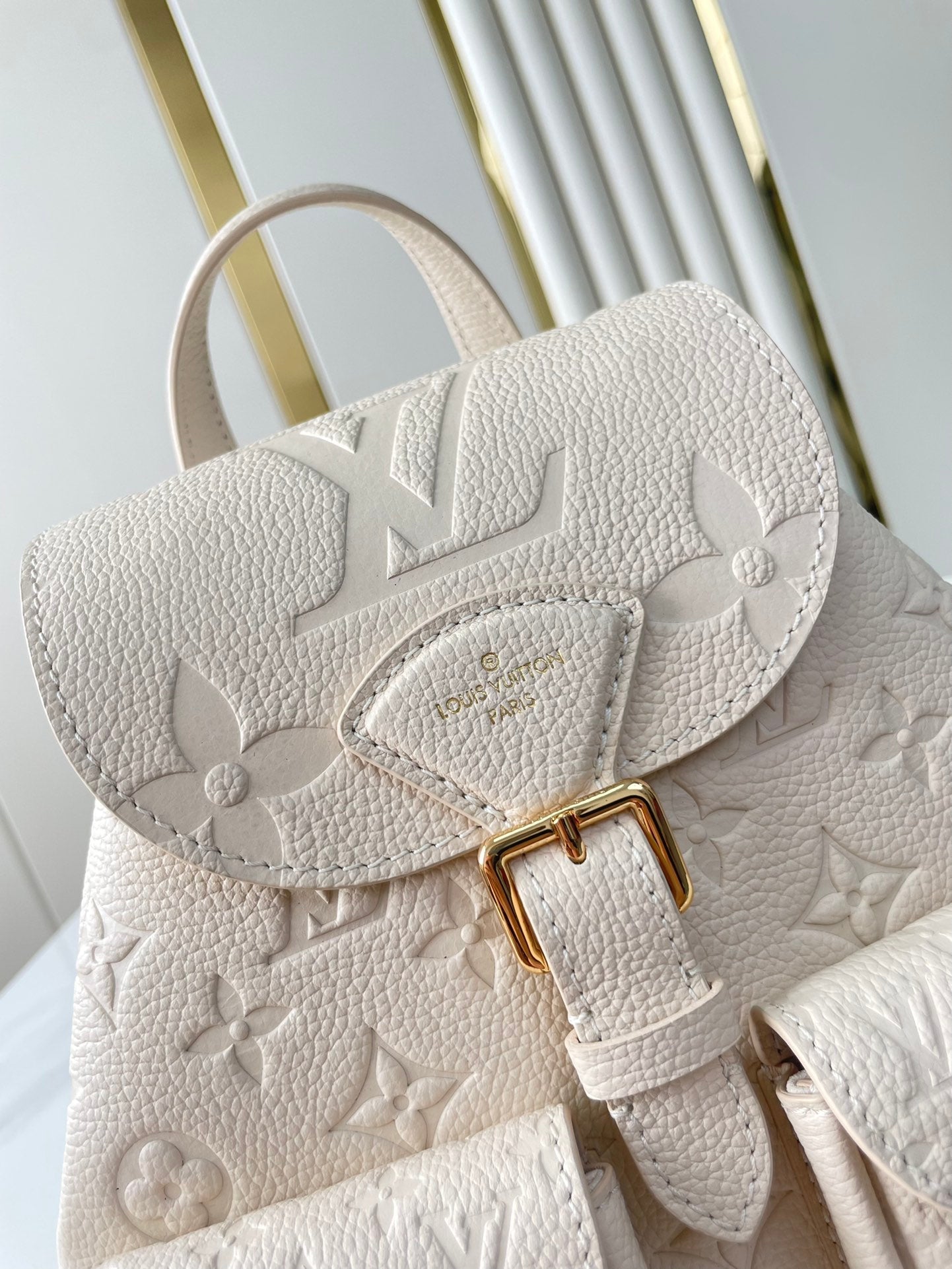 BACKUP-RUCKSACK 22 ZOLL CREME MONOGRAMM EMPREINTE LEDER