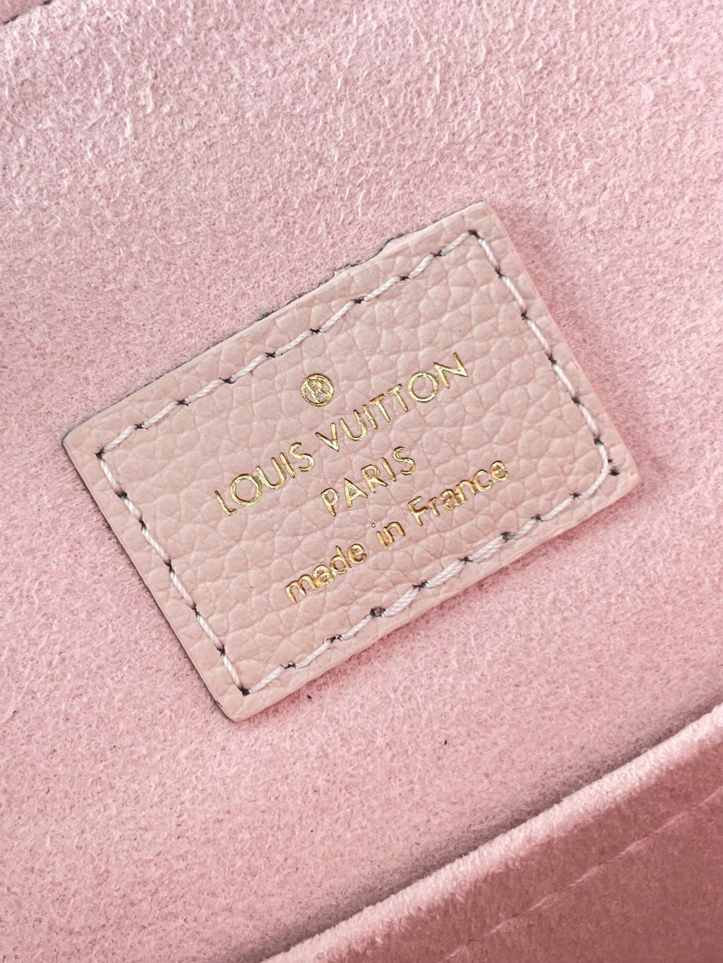 Backup-Rucksack 22 in hellrosa Monogram Empreinte Leder