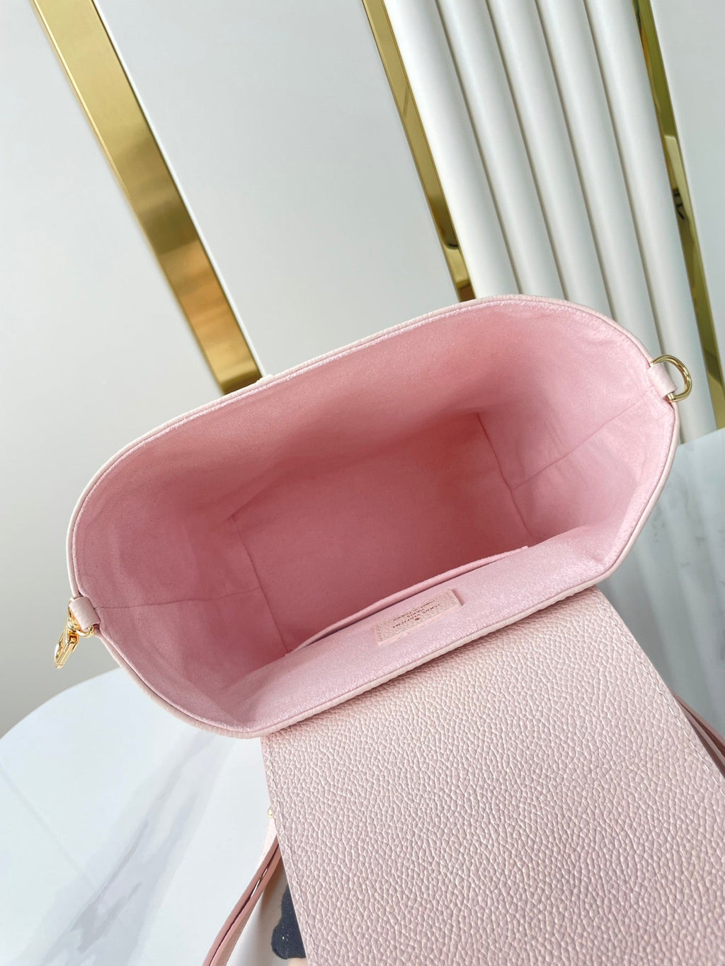 Backup-Rucksack 22 in hellrosa Monogram Empreinte Leder