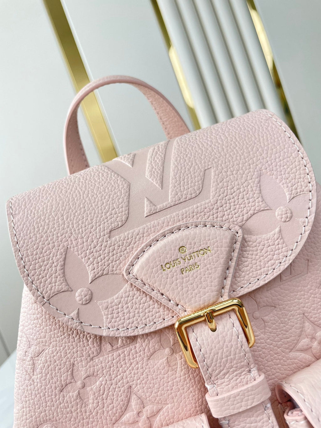 Backup-Rucksack 22 in hellrosa Monogram Empreinte Leder