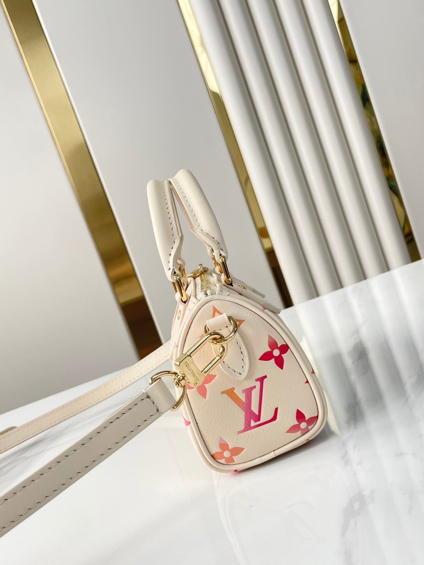 NANO SPEEDY 16 AUS LEDER „SUNRISE AQUARELLE MONOGRAM EMPREINTE“.