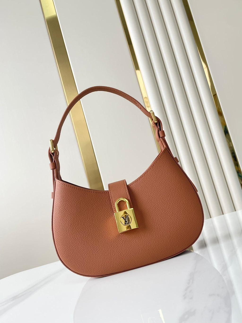 LOW KEY SHOULDER BAG 26 IN COGNAC GRAINED CALFSKIN GOLD BUCKLE