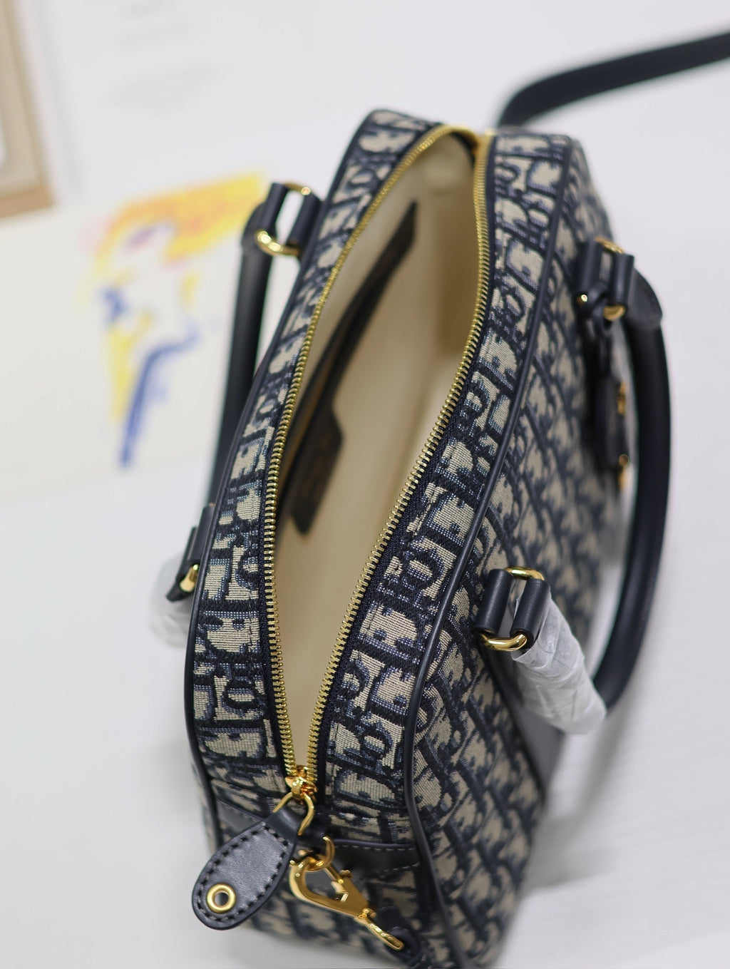 Mittlere 31 D-Vibe Bowlingtasche in blauem Monogram Obliqué Jacquard