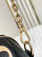 SPEEDY BANDOULIÈRE 20 IN SCHWARZ CREME MONOGRAM EMPREINTE LEDER GOLDENE BESCHLÄGE