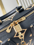 SPEEDY BANDOULIÈRE 20 IN SCHWARZ CREME MONOGRAM EMPREINTE LEDER GOLDENE BESCHLÄGE