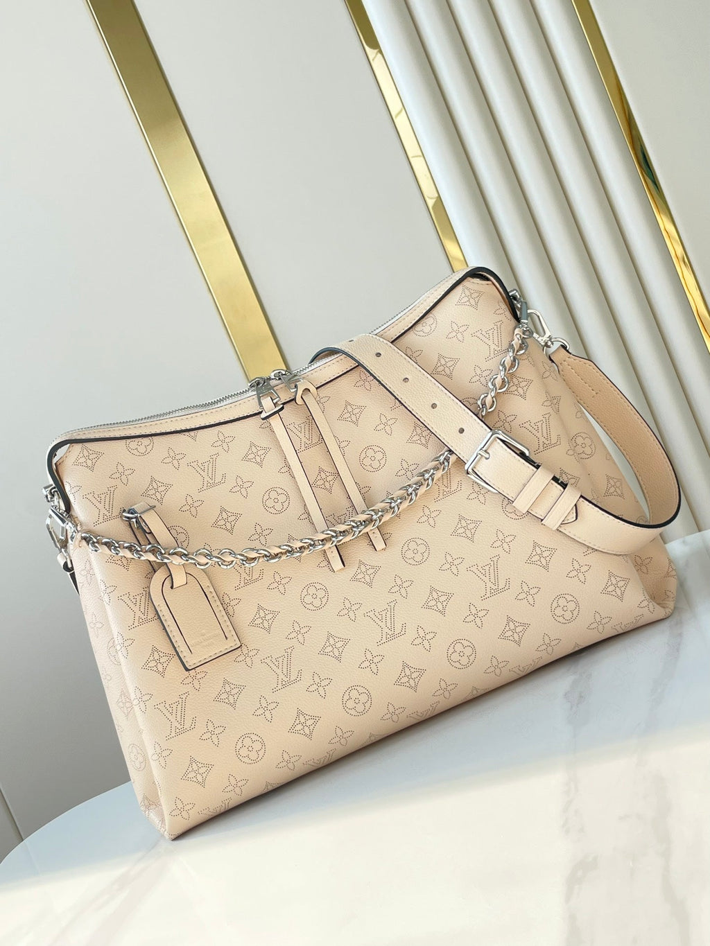 HAND IT ALL MM 32 IN CREAM MONOGRAM PERFORATE CALFSKIN SILVER HARDWARE