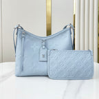 CARRYALL PM 29 IN BEAU BLUE MONOGRAM EMPREINTE LEATHER