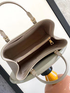 BABYLONE-TASCHE MM 39 AUS TOURTERELLE-MONOGRAMM-EMPREINTE-LEDER