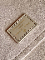 BABYLONE-TASCHE MM 39 AUS TOURTERELLE-MONOGRAMM-EMPREINTE-LEDER