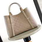 BABYLONE-TASCHE MM 39 AUS TOURTERELLE-MONOGRAMM-EMPREINTE-LEDER