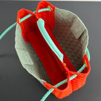 EAST WEST ANDIAMO TASCHE 29 IN ORANGE UND HELLGRÜNEM KALBSLEDER