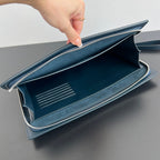 INTRECCIATO CLUTCH 32 IN PICKLED BLUEWOOD WEICHES KALBSLEDER