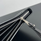 INTRECCIATO CLUTCH 32 IN SCHWARZEM WEICHEM KALBSLEDER