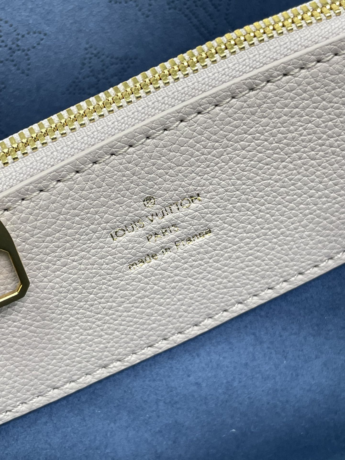 BELLA TOTE 32 IN BLUME PERFORATED CALFLEDER GOLDENE HARDWARE