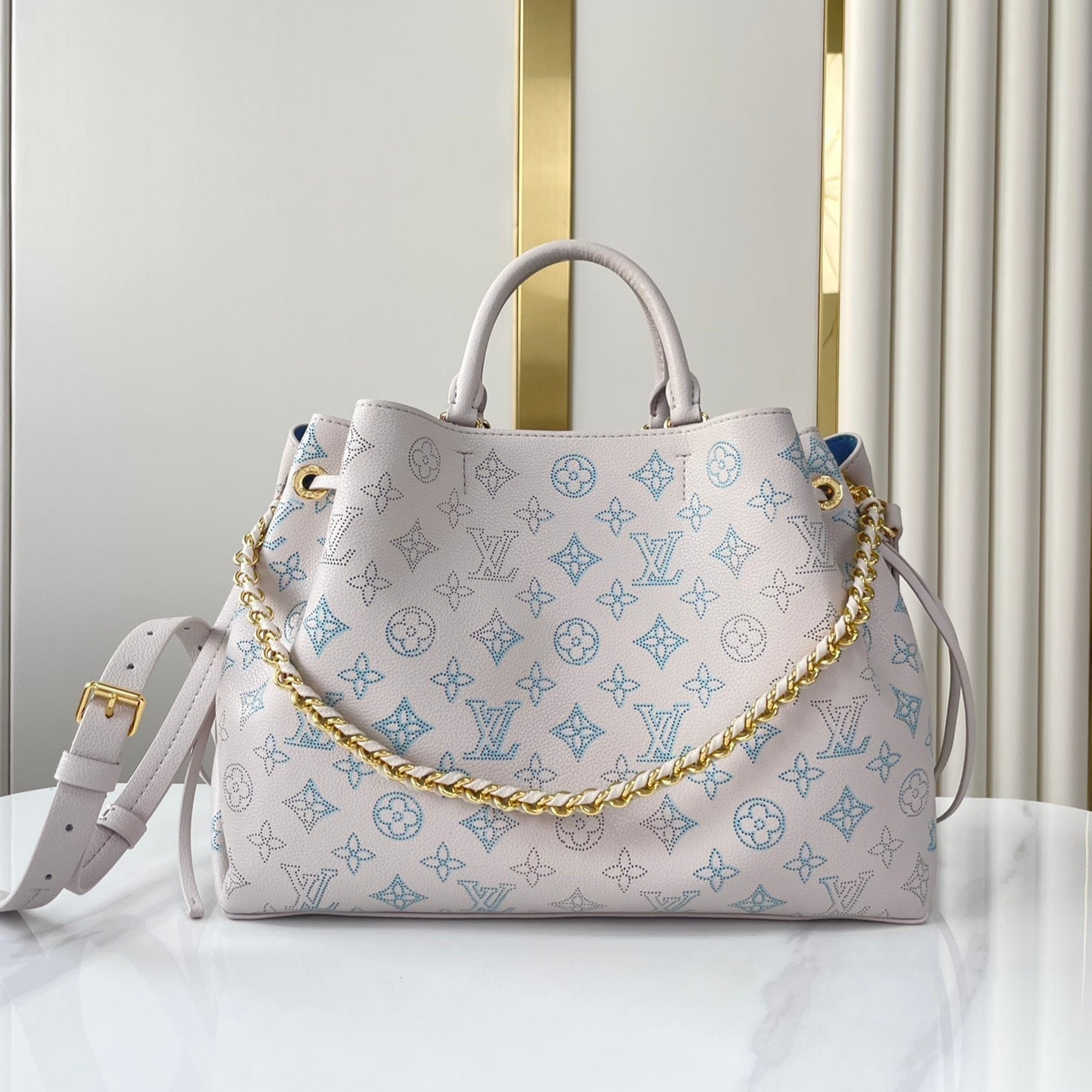 BELLA TOTE 32 IN BLUME PERFORATED CALFLEDER GOLDENE HARDWARE