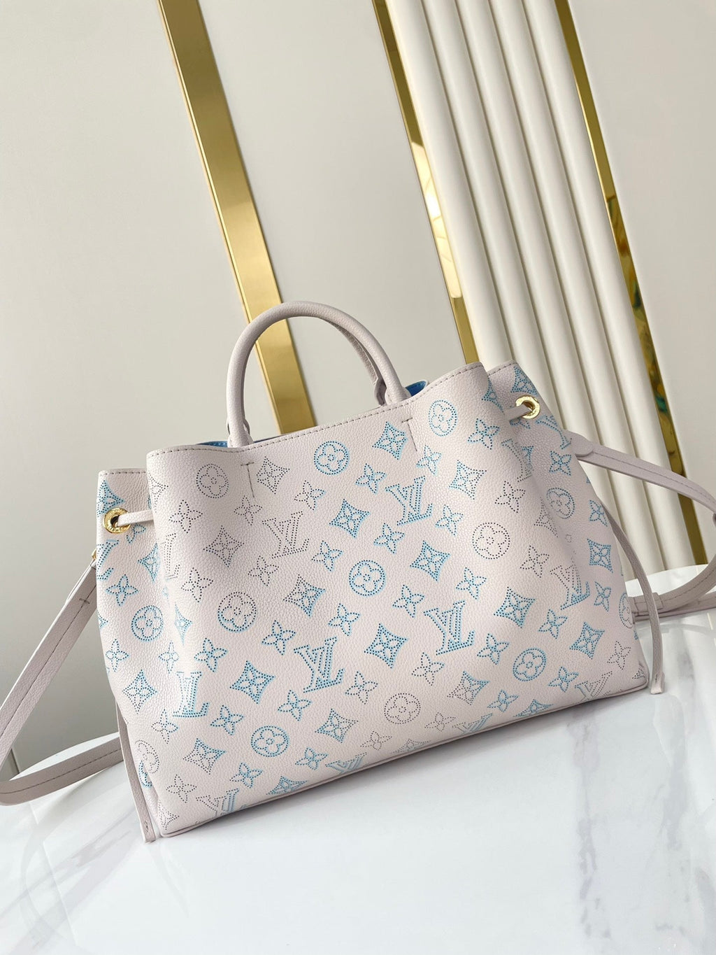 BELLA TOTE 32 IN BLUME PERFORATED CALFLEDER GOLDENE HARDWARE