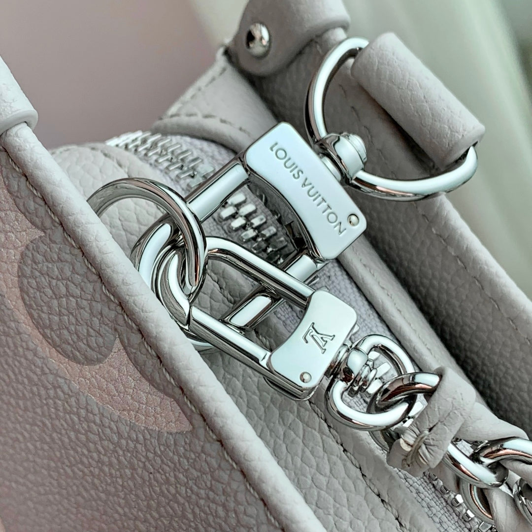 ONTHEGO EAST WEST TASCHE 25 IN BICOLOR MONOGRAM EMPREINTE LEDER