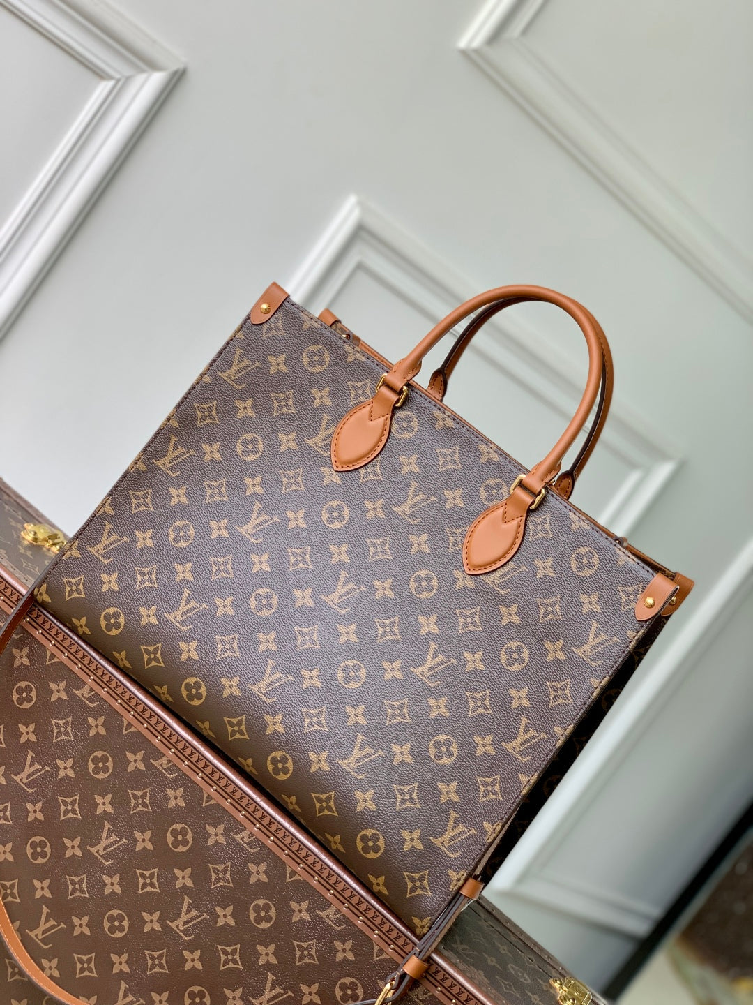 ONTHEGO Organizer 37 aus braun beschichtetem Canvas und Kalbsleder