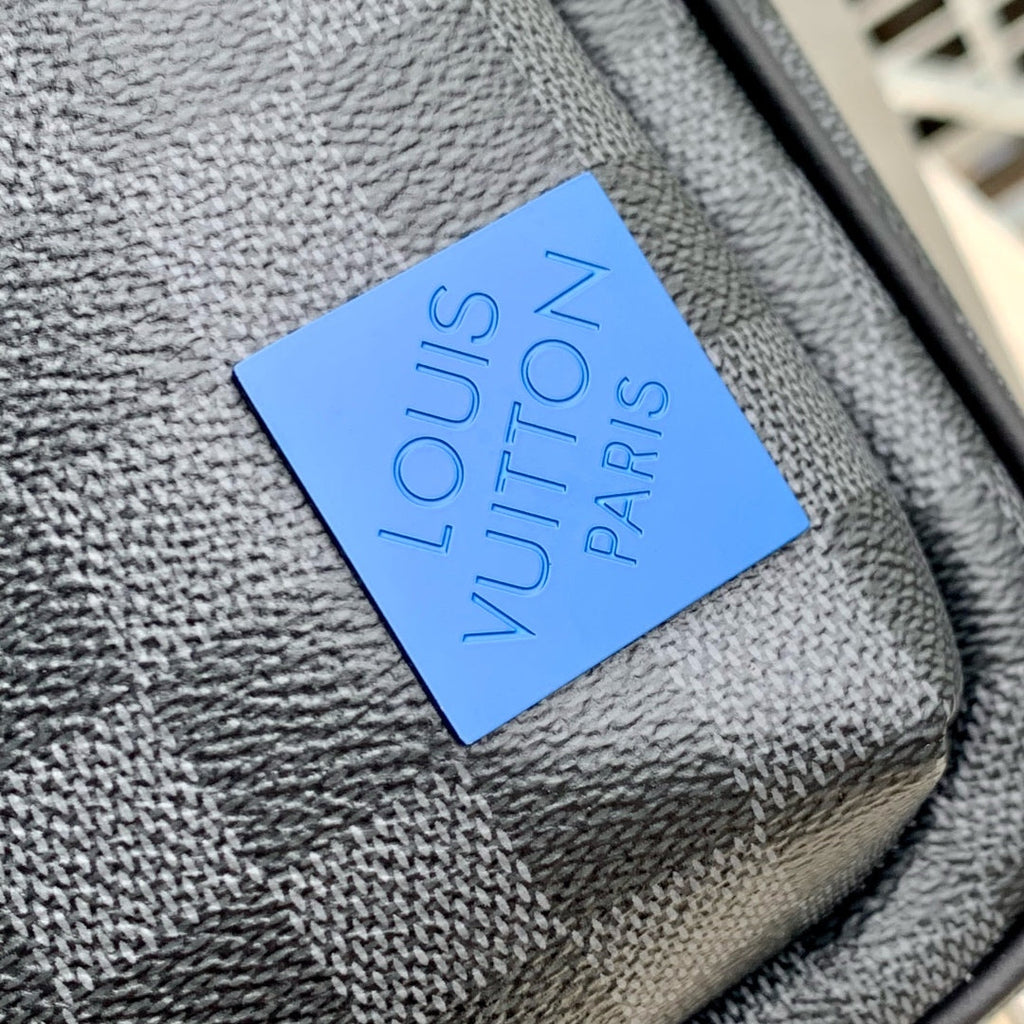 AVENUE SLINGBAG 31 IN SCHWARZ UND GRAU DAMIER GRAPHITA CANVAS CALFLEDER