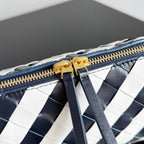 BOTTEGA VENETA 25S CONCERT POUCH 18 IN ZEBRA PATTERN CALFLEDER GOLDENE BESCHLÄGE