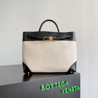 BOTTEGA VENETA 25S MEDIUM ANDIAMO 32 IN ELFENBEINSCHWARZEM KALBSLEDER UND CANVAS