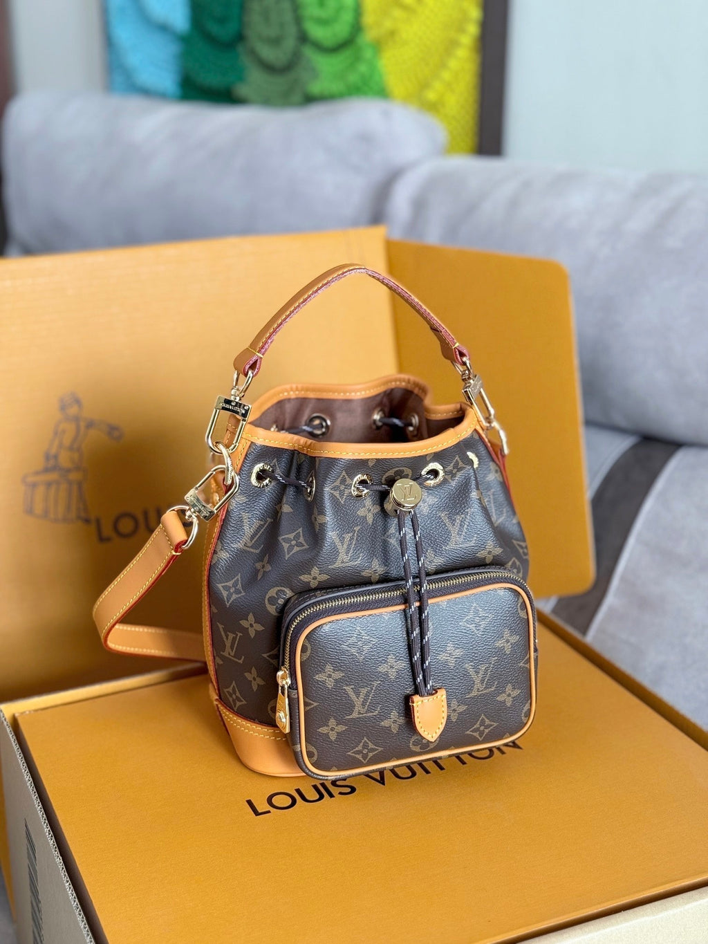 LV 25S NOÉ CARGO 24 IN BROWN MONOGRAM CANVAS GOLD HARDWARE