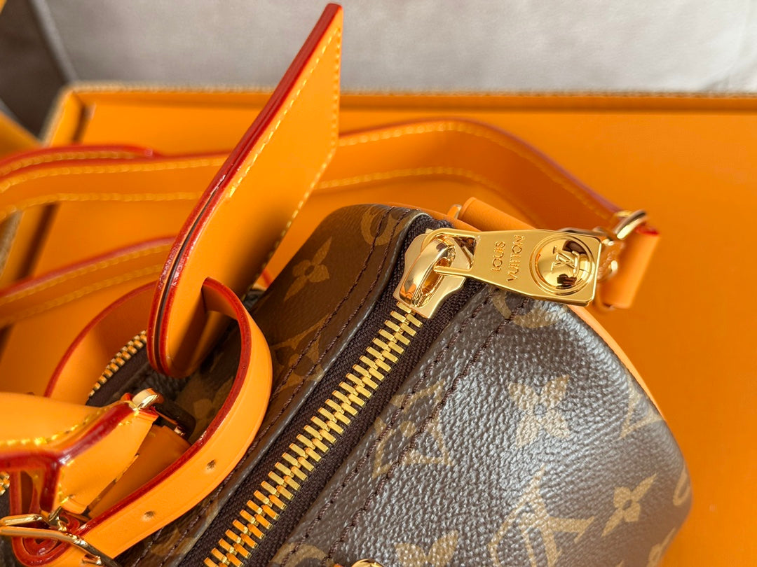 LV 25S KEEPALL CARGO 25 IN BROWN MONOGRAM CANVAS AND CALFSKIN GOLD HARDWARE