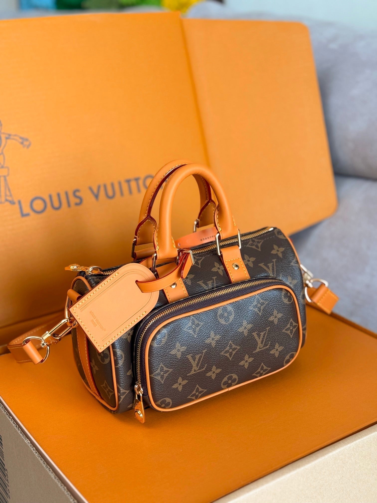 LV 25S Keepall Cargo 25 in braunem Monogramm-Canvas und goldfarbenen Beschlägen aus Kalbsleder