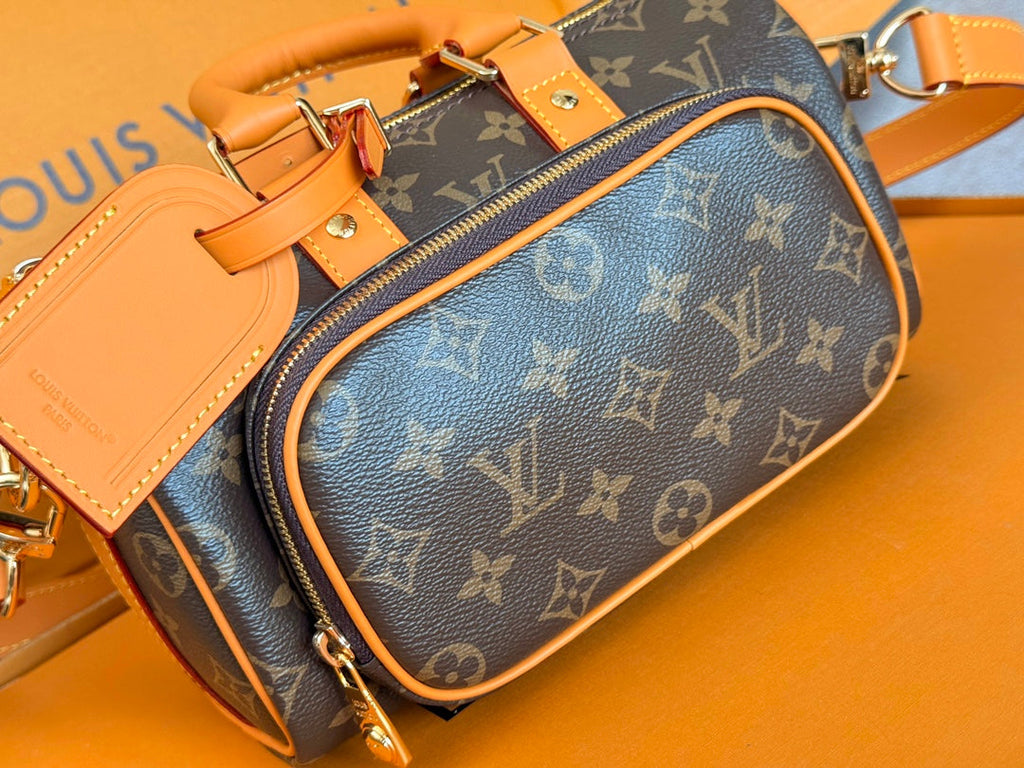 LV 25S KEEPALL CARGO 25 IN BROWN MONOGRAM CANVAS AND CALFSKIN GOLD HARDWARE