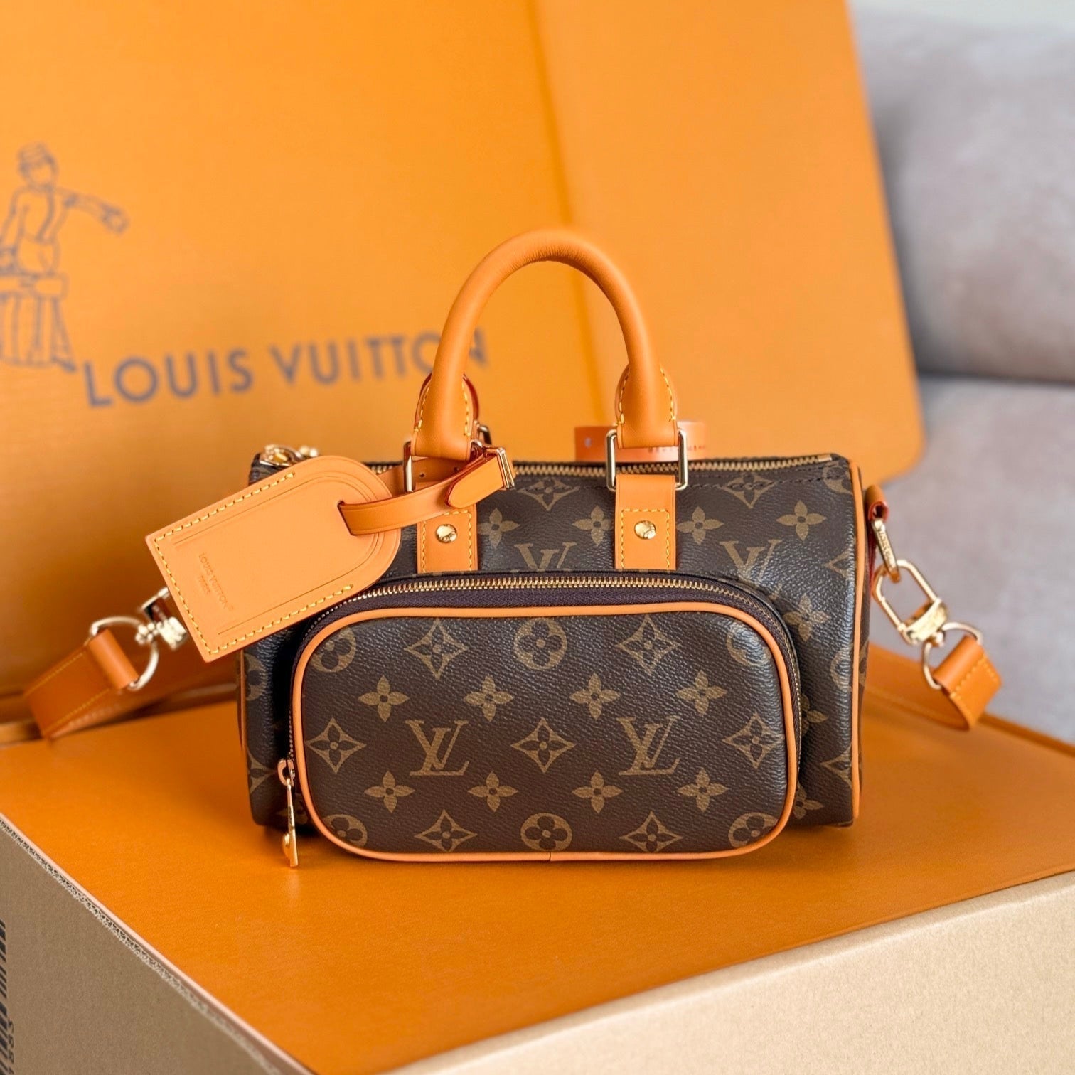 LV 25S Keepall Cargo 25 in braunem Monogramm-Canvas und goldfarbenen Beschlägen aus Kalbsleder