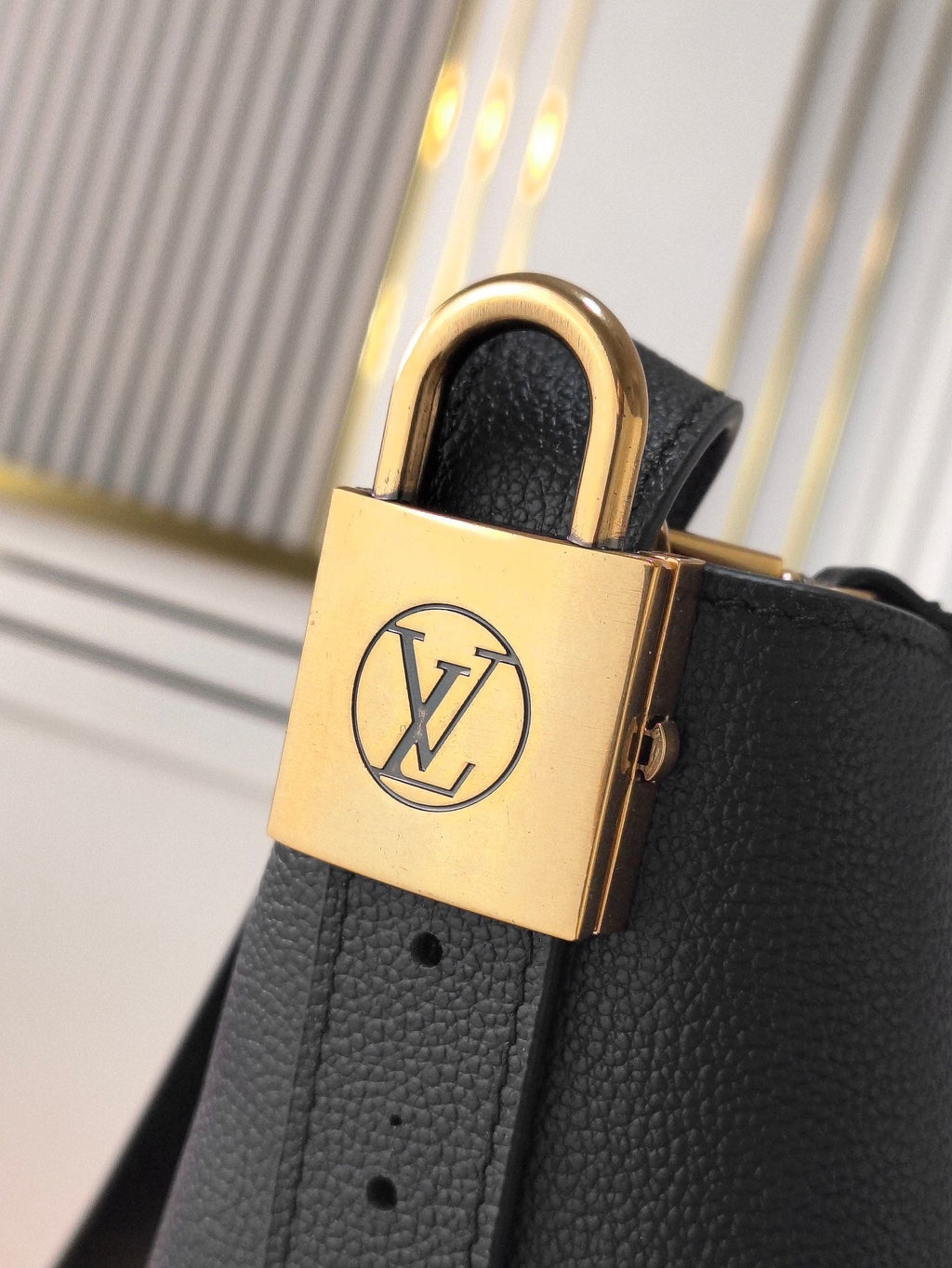 LV 25S LOW KEY ALL IN BB 18 IN BLACK CALFSKIN GOLD HARDWARE