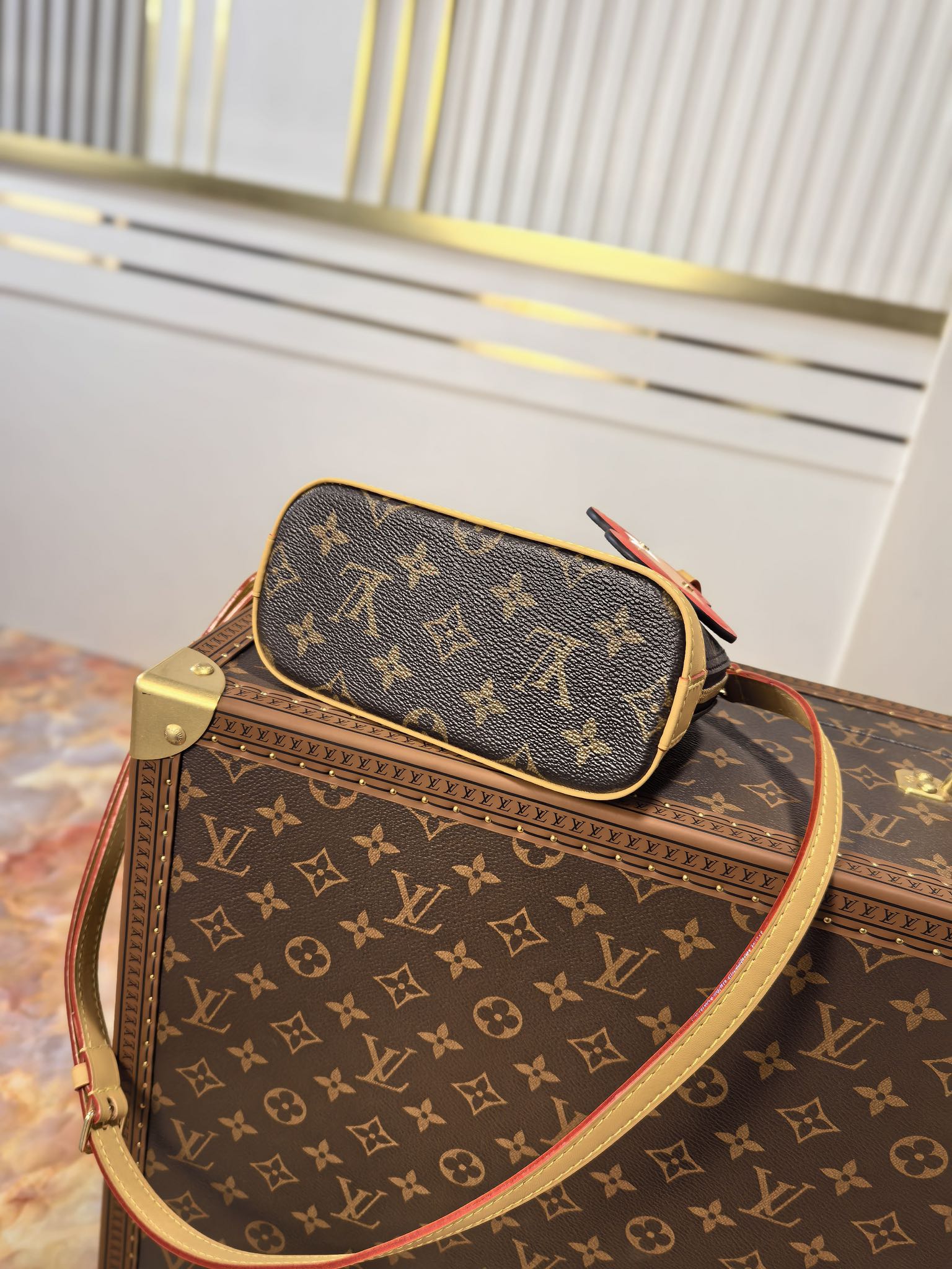 LV 25S NANO ALMA 18 IN BROWN MONOGRAM CANVAS PRINTED WITH THE VIVIENNE MASCOT