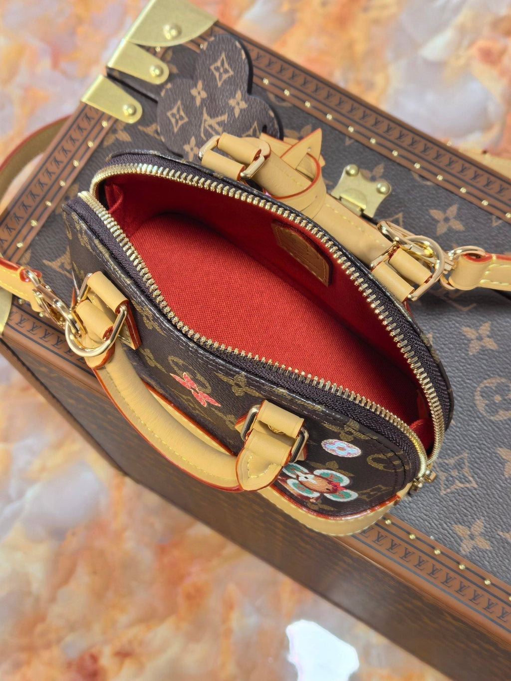 LV 25S NANO ALMA 18 IN BROWN MONOGRAM CANVAS PRINTED WITH THE VIVIENNE MASCOT