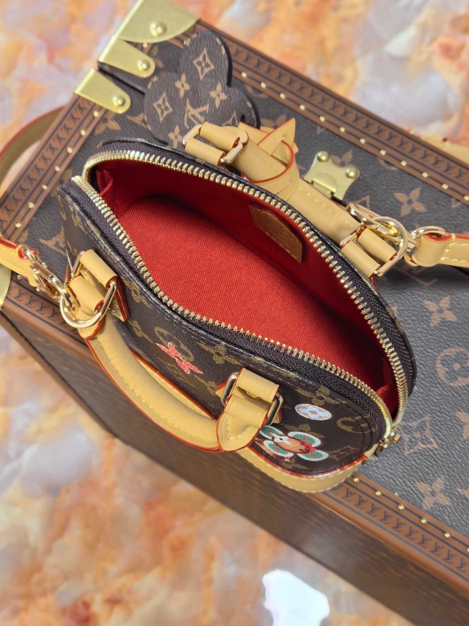 LV 25S NANO ALMA 18 IN BROWN MONOGRAM CANVAS PRINTED WITH THE VIVIENNE MASCOT