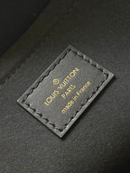 BABYLONE-TASCHE 31 AUS SCHWARZEM MONOGRAMM-EMPREINTE-LEDER