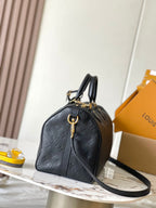 SPEEDY SOFT 30 IN SCHWARZEM MONOGRAM EMPREINTE LEDER