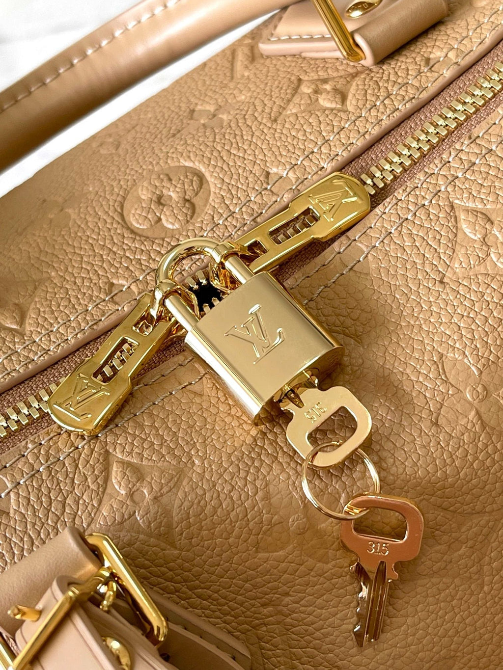 SPEEDY SOFT 30 IN PALE ORANGE EPROSSED CALFSKIN