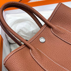 GARDEN PARTY 23CM IN UMBER BROWN CALFSKIN