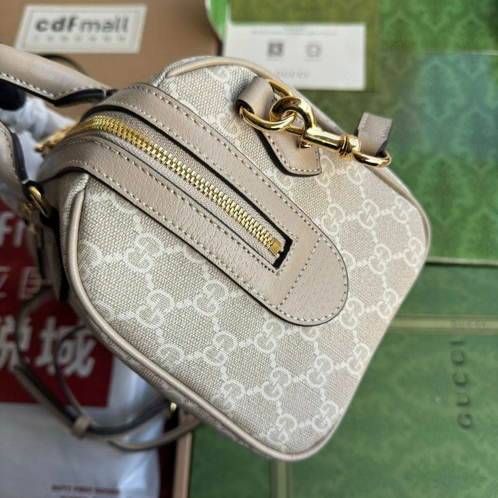 OPHIDIA KLEINE TRAGETASCHE 26 IN BEIGE WEISSES CANVAS MIT HAFERFARBENEM KALBSLEDERBESATZ GOLDENE BESCHLÄGE