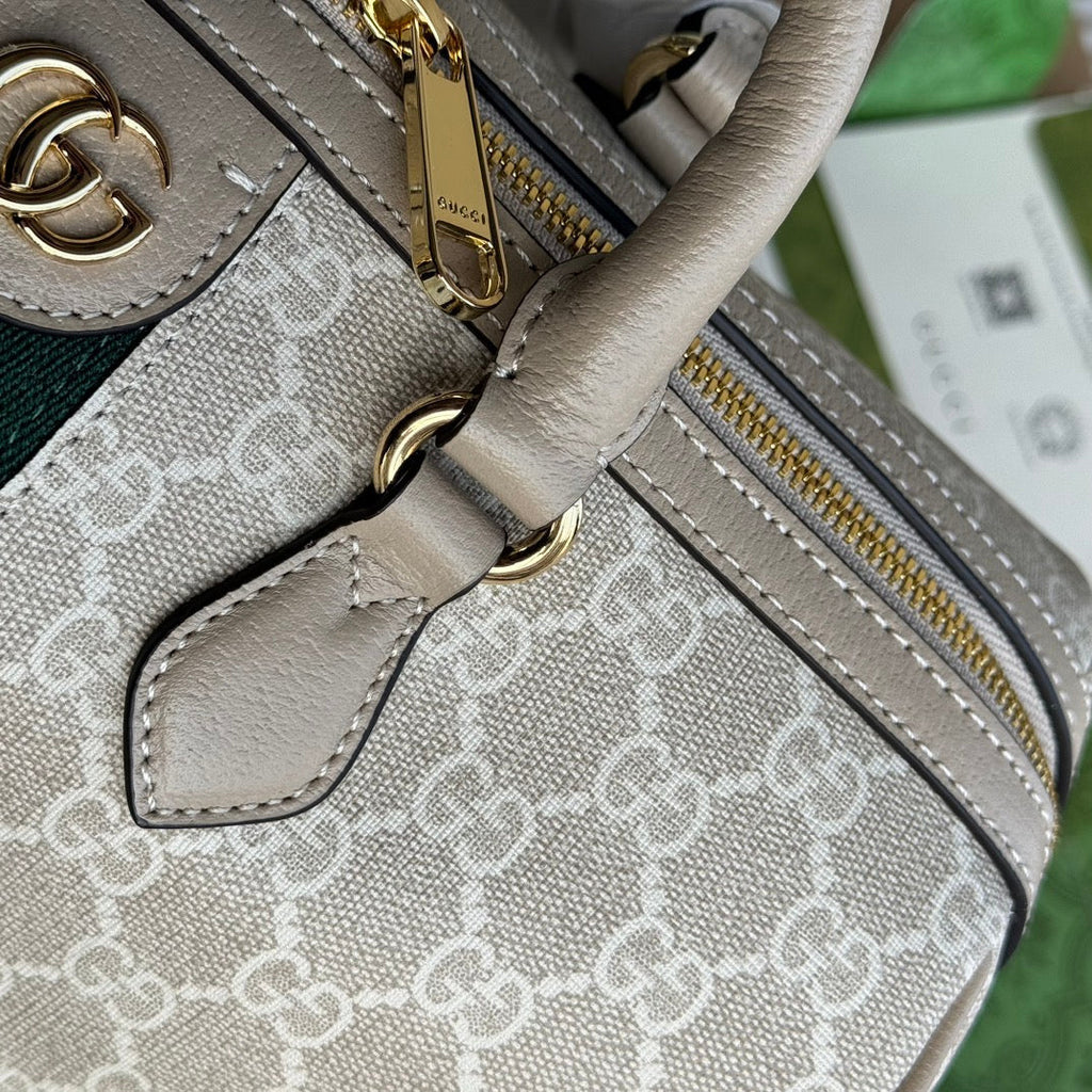 OPHIDIA MITTLERE HANDTASCHE 31 IN BEIGE WEISSEM CANVASE MIT BESATZ AUS HAFERFARBENEM KALBSLEDER UND GOLDENEN BESCHLÄGEN