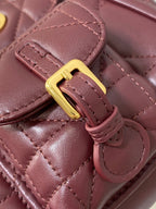 KLEINER 20-CARO-RUCKSACK IN PFLAUMENLILA MAKROCANNAGE-LAMMLEDER